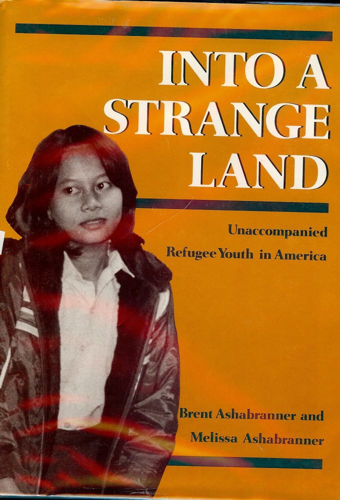 Item #1197 INTO A STRANGE LAND: UNACCOMPANIED REFUGEE YOUTH IN AMERICA. Brent ASHABRANNER.