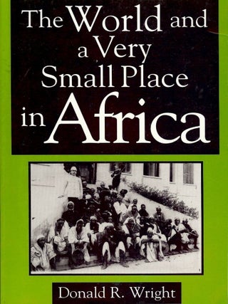 Item #1913 THE WORLD AND A VERY SMALL PLACE IN AFRICA. Donald R. WRIGHT