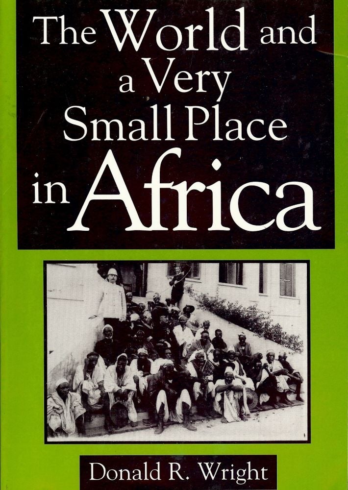 Item #1913 THE WORLD AND A VERY SMALL PLACE IN AFRICA. Donald R. WRIGHT.